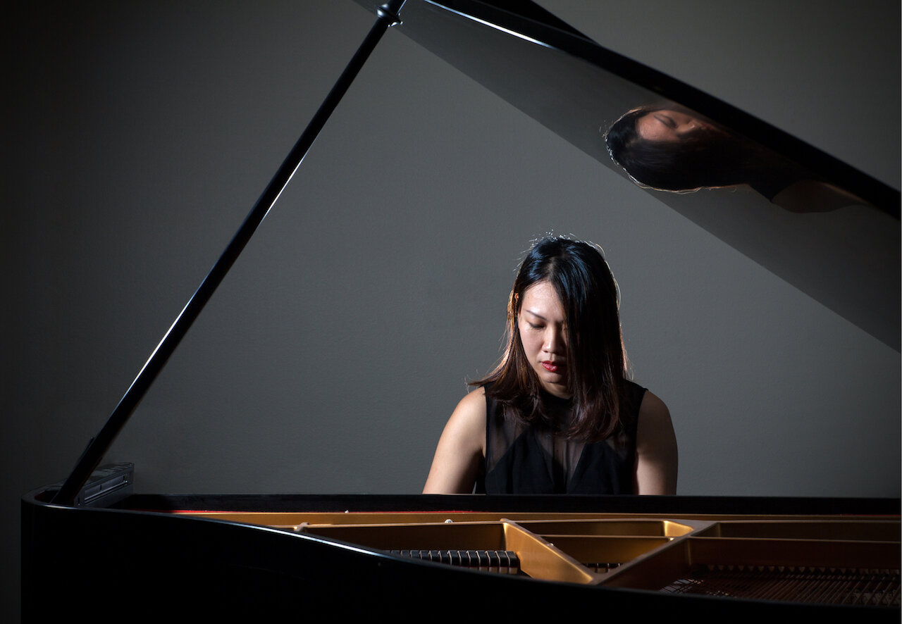 Isabelle Ang playing the piano